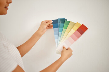Woman, renovation and choice colour for wall at house with designer for an idea for room. Female...