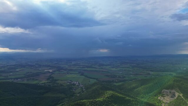 French countryside. Panoramic drone view of tree-covered hillsides and heavy rains of the Vercors, Val de Drome, France