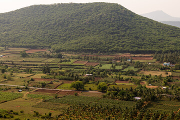 Naklejka premium Hilltop View of Rural Agriculture Farmland