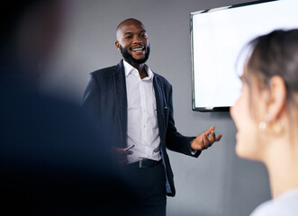 Meeting, presentation and training with a business black man in the boardroom for a coaching seminar. Management, education and planning with a young male speaker in he office during a workshop