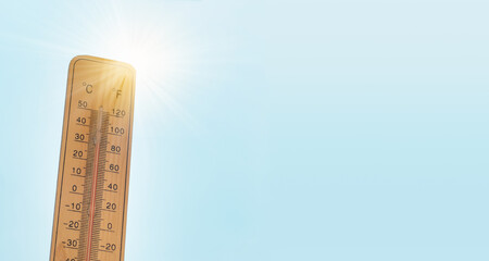 Thermometer with blue sky and sun, measure the temperature, weather forecast, global warming and environment discussion, summer season with heat wave 