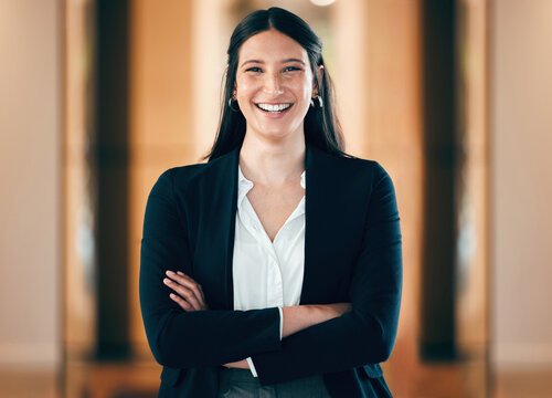 Portrait, Smile And Arms Crossed With A Corporate Business Woman In Her Professional Workplace. Happy, Mindset And Confident With A Happy Female Employee Standing In Her Office Wearing A Power Suit