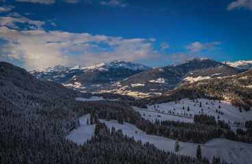 A Mountain valley near Techendorf and lake Weissensee in Carinthia or Karnten, Austria. Panoramic aerial drone picture. January 2022