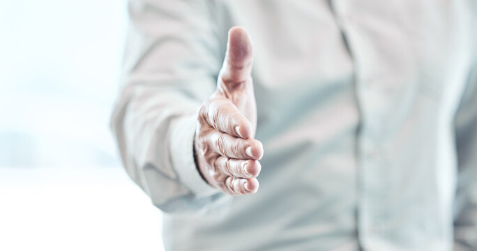 Businessman, handshake and meeting for hiring, welcome or introduction at the workplace. Hand of man employer shaking hands for business deal, recruiting or greeting at the office