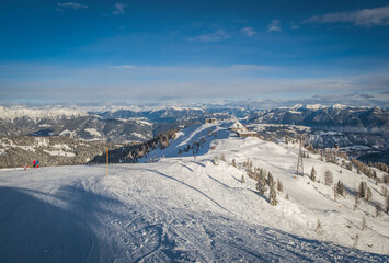 Mountain ski resort Nassfeld near Hermagor, Austria - morning view of well prepared slopes with no people. January 2022