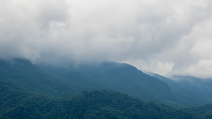 Obraz na płótnie Canvas Clouds on the Mountains Landscape