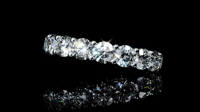 Diamond eternity ring swaying on black glossy background. Seamless loop 3d animation