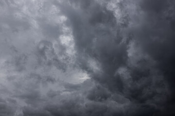 Naklejka na ściany i meble Clouds background, Rain clouds become dark gray like a big smoke before rainfall.