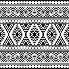 Vector illustration with ethnic style design. Seamless geometric pattern. Navajo and Aztec tribal motif. Black and white color. Design for textile, fabric, clothes, curtain, rug, ornament, background.