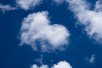 Naklejka na ściany i meble Abstract white cloud on blue sky