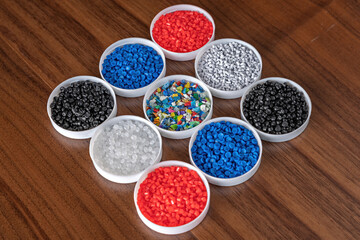White plastic grain, plastic polymer granules,hand hold Polymer pellets, Raw materials for making...