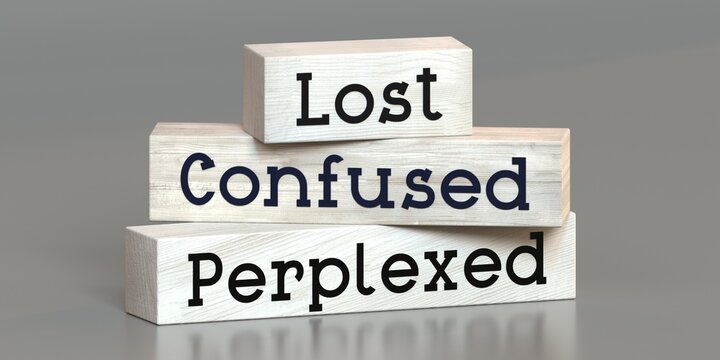 Lost, confused, perplexed - words on wooden blocks - 3D illustration