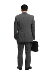 Obraz na płótnie Canvas Businessman with briefcase posing on white background, back view