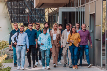 A diverse group of businessmen and colleagues walking together by their workplace, showcasing collaboration and teamwork in the company.