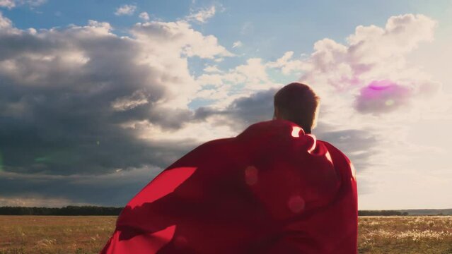 child boy son kid superhero plays park sunset red cape wind, childhood dream happy family wind, business leader game, dreams. kid running red raincoat, adventure holiday red cape, winner masked nature