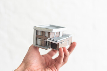 Property insurance concept, toy house