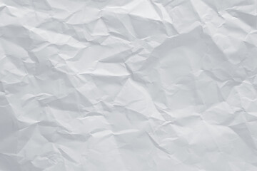 White crumpled paper texture background, clean white wrinkled paper, top view.