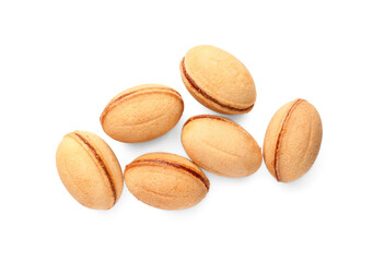 Delicious nut shaped cookies with boiled condensed milk on white background, top view