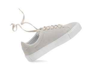 One stylish beige sneaker isolated on white