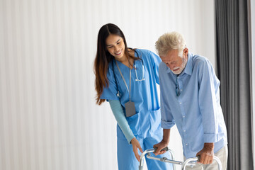Home care. disabled old man with walker at home. Professional caregiver nursing home. Nurse...