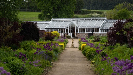 An old greenhouse in a formal garden