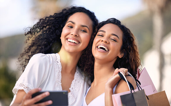 Phone, selfie and friends or women with shopping bag, city photography and happy sale, discount or deal for retail. Face of influencer, african people or customer in profile picture for fashion promo