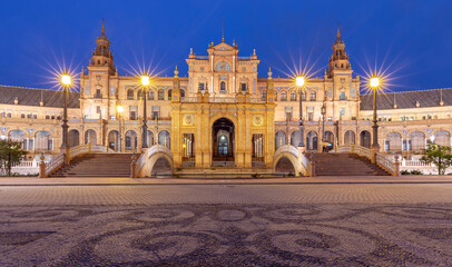 Plaza of Spain at sunset in night illumination. Seville. Andalusia.