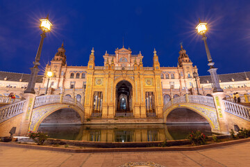 Plaza of Spain at sunset in night illumination. Seville. Andalusia.