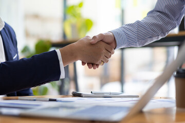 business people shaking hands in partnership meeting and business cooperation.