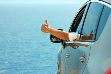 A happy guy in auto sea background