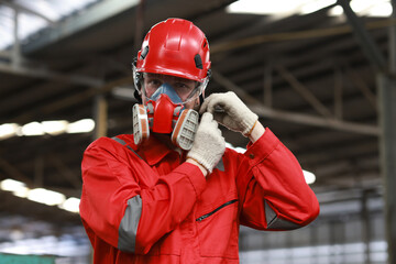 Chemical leak and safety first concept. Group of chemical specialist wear safety uniform, gas mask...