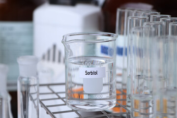 Sorbitol in container, chemical analysis in laboratory