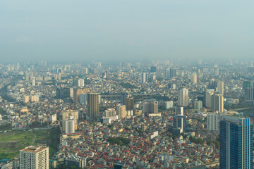 Fototapeta premium Aerial view of Hanoi Downtown Skyline, Vietnam. Financial district and business centers in smart urban city in Asia. Skyscraper and high-rise buildings.