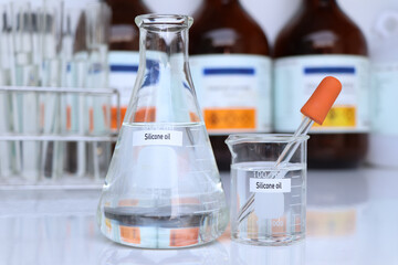 Silicone oil in container, chemical analysis in laboratory