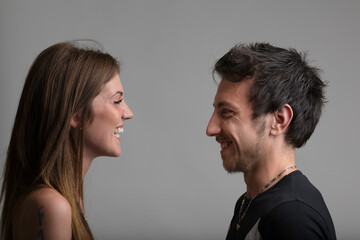 Fototapeta premium Man, woman face each other, emotional