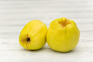 Quince fruit close-up on a white background.