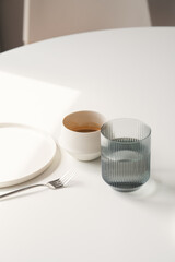 TABLE SERVICE WITH LIGHT COLOR GLASS AND CUP