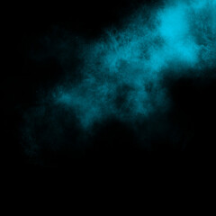 Turquoise color powder explosion isolated on black background. Royalty high-quality free stock Freeze motion Turquoise green powder exploding. Colorful dust explode. Paint Holi, dust particles splash