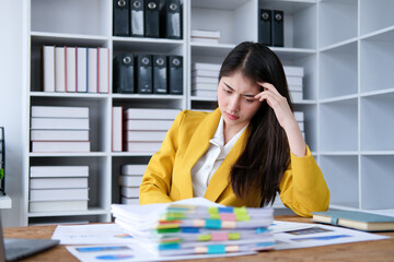 Confident business woman Sad and worried working with a laptop in an office ,hard work, overworked concept.