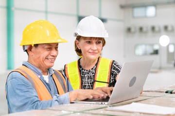 senior woman business manager with warehouse programmer software engineer work with professional service data computer in storage warehouse of storage and transportation logistic