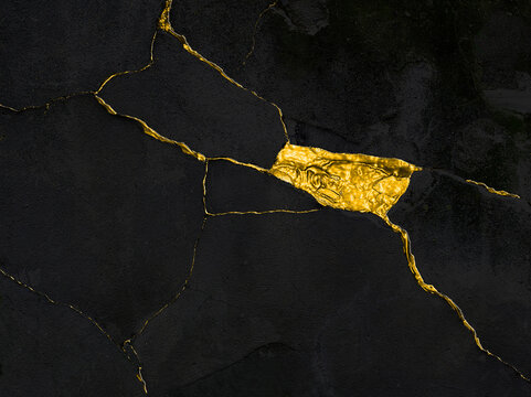 Brick kintsugi style with gold cracks. Breaked stone wall, cracked plaster, cracks, for mock up. Rustic old surface. Empty background