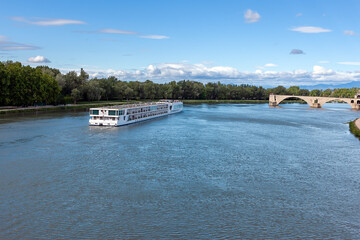 Pleasure boat on the river Rhone. Avignon city , Provence, France