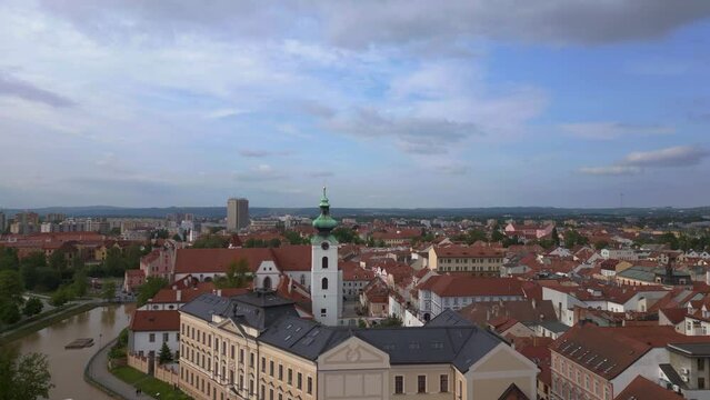 Czech city Budweis church town bell tower. Majestic aerial top view flight drone