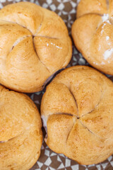Kaiser rolls on paper serviette, closeup