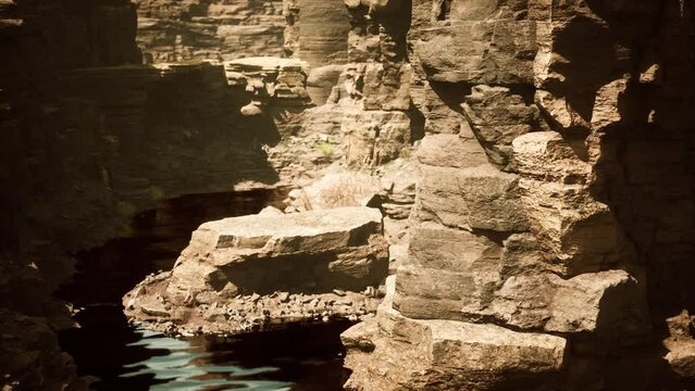 Beautiful Red River and shores of colored sandstone
