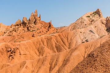 Fototapeta premium Skazka (Fairytale) Canyon - the most unusual and picturesque gorge on the southern shore of Issyk-Kul, the main attraction in the vicinity of the lake, Kyrgyzstan