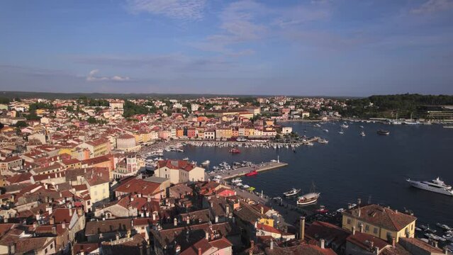 Aerial panoramic drone view of town and tourist destination of Rovinj on the Istrian peninsula, waterfront and the old town on a sunny day, Rovinj, Istria Region