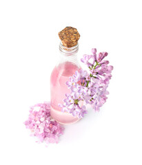 Bottle of cosmetic oil with beautiful lilac flowers on white background