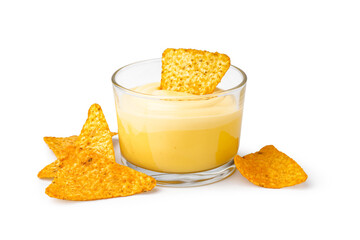 Bowl with tasty cheddar cheese sauce and nachos on white background