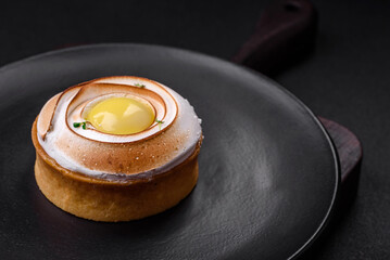 Delicious tart with citrus filling and walnut cream